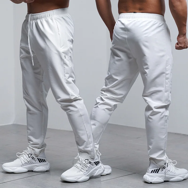 Outdoor Sport Waterproof Pants - تنفس فضفاض تشغيل السراويل الرجال الخريف